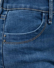 JEANS SKINNY TIRO ALTO