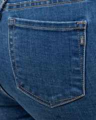 JEANS SKINNY TIRO ALTO