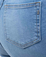 JEANS SKINNY TIRO SUPER ALTO