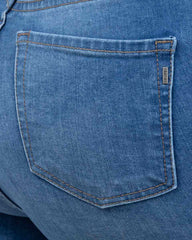 JEANS SKINNY TIRO SUPER ALTO