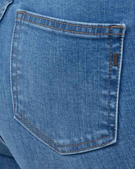 JEANS SKINNY TIRO SUPER ALTO