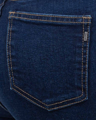 JEANS SKINNY TIRO SUPER ALTO