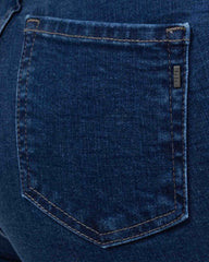 JEANS SKINNY TIRO SUPER ALTO