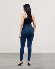 JEANS SKINNY TIRO SUPER ALTO