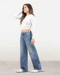 JEAN TIRO MEDIO WIDE LEG