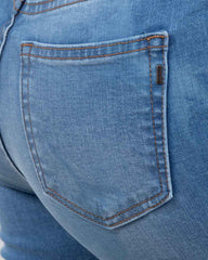 PETITE BOOTCUT TIRO ALTO